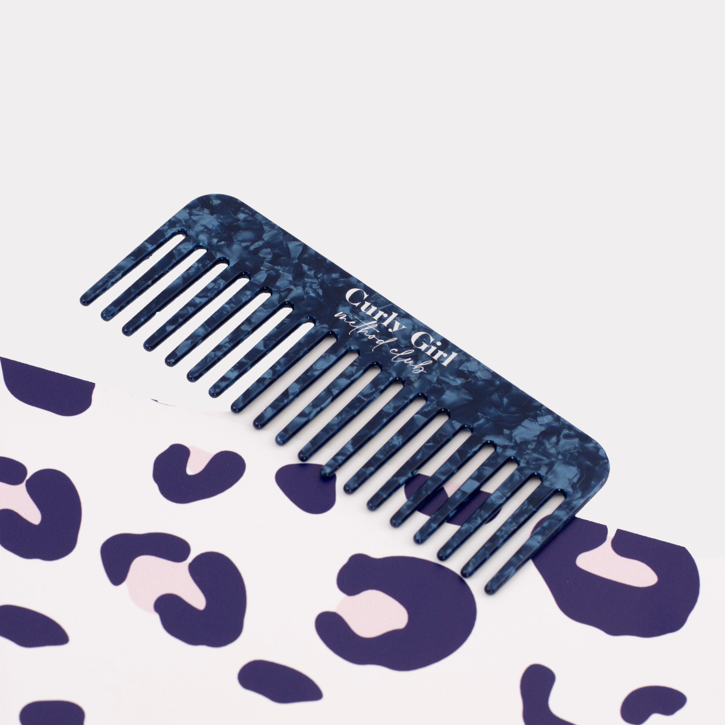 Step 1: Anti Static Wide Tooth Comb to detangle waves and curls